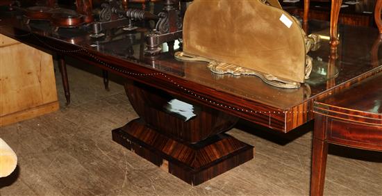 Modern rosewood dining table with glass top